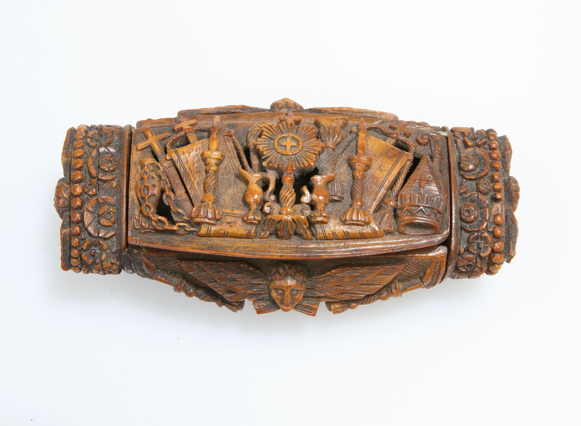 A 19TH CENTURY CARVED COQUILLA NUT SNUFF BOX