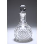 AN EARLY 19TH CENTURY CUT-GLASS DECANTER, PROBABLY IRISH