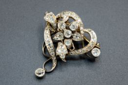 A DIAMOND SET BROOCH