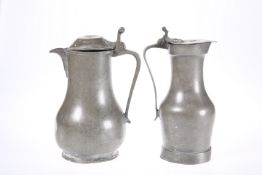 TWO PEWTER LIDDED FLAGONS, 18th CENTURY