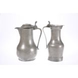TWO PEWTER LIDDED FLAGONS, 18th CENTURY