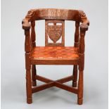 A RARE MOUSEMAN ADZED OAK MONKS CHAIR, 1930