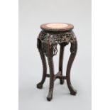 A CHINESE MARBLE-INSET HARDWOOD JARDINIERE STAND, CIRCA 1900