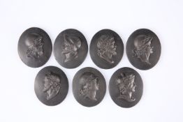 A SET OF SEVEN BLACK BASALT CAMEOS OF KINGS OF ENGLAND