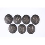 A SET OF SEVEN BLACK BASALT CAMEOS OF KINGS OF ENGLAND