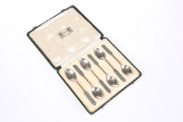 A SET OF SIX LIBERTY & CO SILVER AND ENAMEL SPOONS
