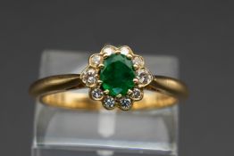 AN 18CT YELLOW GOLD, EMERALD AND DIAMOND RING