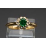 AN 18CT YELLOW GOLD, EMERALD AND DIAMOND RING