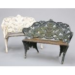 A PAIR OF FERN AND BLACKBERRY PATTERN CAST IRON GARDEN BENCHES