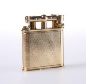 AN ALFRED DUNHILL 9 CARAT GOLD LIGHTER, LONDON 1932