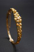 A SEED PEARL SET BANGLE