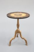 A PAINTED AND GILT-GESSO OCCASIONAL TABLE