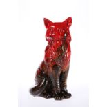 A ROYAL DOULTON FLAMBE VEINED MODEL OF A SEATED CAT