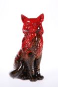 A ROYAL DOULTON FLAMBE VEINED MODEL OF A SEATED CAT