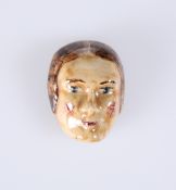 AN UNUSUAL HIGH-GLAZED POTTERY FACE