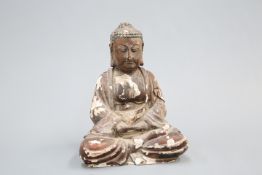 A GILT LACQUERED WOOD FIGURE OF THE BUDDHA