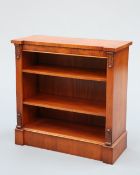 A REGENCY STYLE BURR WALNUT OPEN BOOKCASE