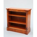 A REGENCY STYLE BURR WALNUT OPEN BOOKCASE