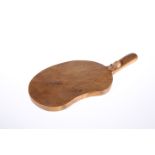 A MOUSEMAN OAK KIDNEY-SHAPED CHEESEBOARD