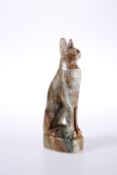 A CARVED STONE MODEL OF A SEATED CAT IN EGYPTIAN STYLE. 16.5cm