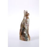 A CARVED STONE MODEL OF A SEATED CAT IN EGYPTIAN STYLE. 16.5cm