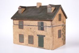A PRIMITIVE PAINTED WOODEN BOX IN THE FORM OF A HOUSE