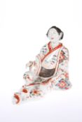 A JAPANESE IMARI FIGURE OF A BIJIN, 17TH/18TH CENTURY