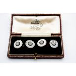 A PAIR OF DIAMOND, ENAMEL AND BLACK ONYX CUFFLINKS