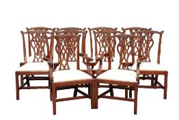 A SET OF TEN CHIPPENDALE STYLE MAHOGANY DINING CHAIRS