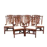 A SET OF TEN CHIPPENDALE STYLE MAHOGANY DINING CHAIRS