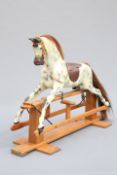 HADDON ROCKERS, A CARVED AND PAINTED ROCKING HORSE