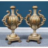 A PAIR OF ITALIAN GILDED, PAINTED AND CARVED PINE BASES