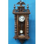 A LATE 19TH CENTURY WALNUT CASED VIENNA PATTERN WALL CLOCK