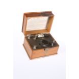 A WIRELESS ERICSSON BBC CRYSTAL RADIO RECEIVER, oak cased