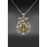 A CEYLON YELLOW SAPPHIRE AND DIAMOND PENDANT