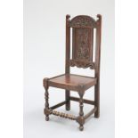 AN OAK PANEL-BACK CHAIR