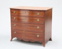 A GEORGE III MAHOGANY AND KINGWOOD BANDED BOW-FRONT CHEST OF DRAWERS