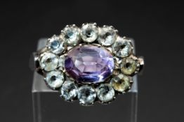 AN AMETHYST AND PASTE RING