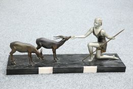 A FRENCH PATINATED SPELTER GROUP, IN THE ART DECO TASTE