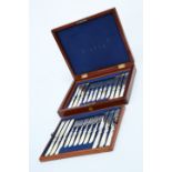 A SET OF TWELVE VICTORIAN SILVER-PLATED AND MOTHER-OF-PEARL HANDLED DESSERT KNIVES AND FORKS