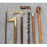 A GROUP OF STICKS, to include a Sherwood Foresters swagger stick