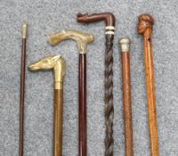 A GROUP OF STICKS, to include a Sherwood Foresters swagger stick