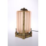 A STRIKING BRONZE AND MOULDED GLASS TABLE LAMP IN THE ART DECO TASTE,