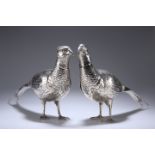 A LARGE MATCHED PAIR OF EDWARDIAN SILVER TABLE PHEASANTS