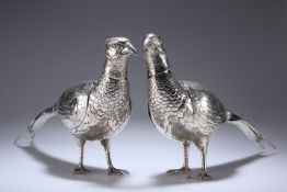 A LARGE MATCHED PAIR OF EDWARDIAN SILVER TABLE PHEASANTS