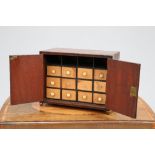 A GEORGIAN CROSSBANDED AND STRING-INLAID MAHOGANY TABLE CABINET