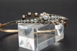 A LATE 19TH CENTURY DIAMOND SET BANGLE