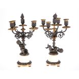 A PAIR OF 19TH CENTURY FRENCH PARCEL-GILT BRONZE AND ALABASTER FIGURAL CANDELABRA