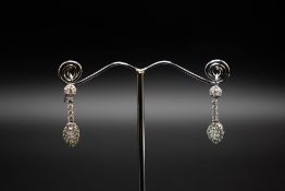 A PAIR OF DIAMOND EARRINGS