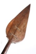 TRIBAL: A SOUTH SEA ISLANDS PADDLE, the pointed blade with incised tracery